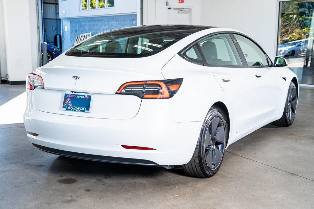 used 2023 Tesla Model 3 car, priced at $25,999