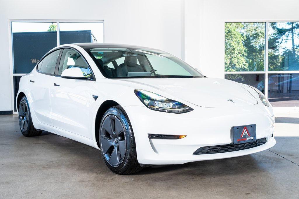 used 2023 Tesla Model 3 car, priced at $25,999