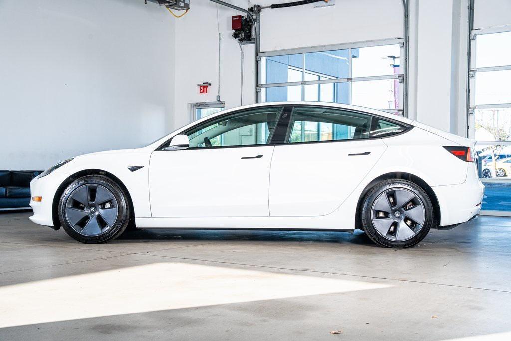 used 2023 Tesla Model 3 car, priced at $25,999
