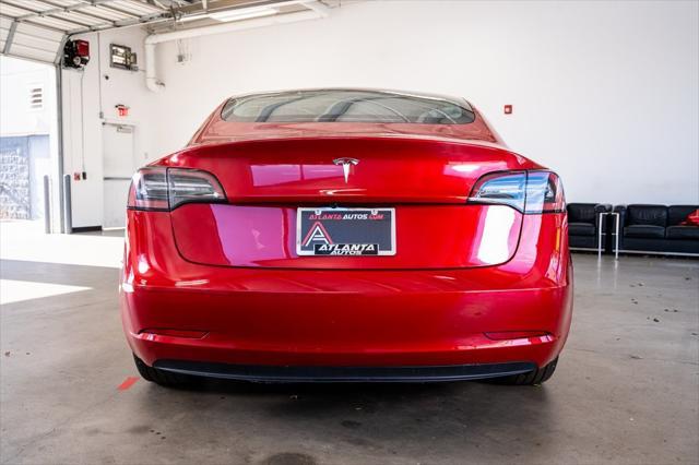 used 2023 Tesla Model 3 car, priced at $26,999