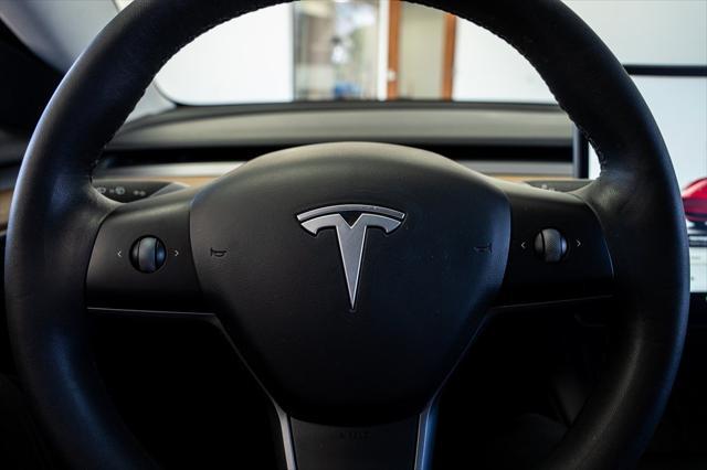 used 2023 Tesla Model 3 car, priced at $26,999