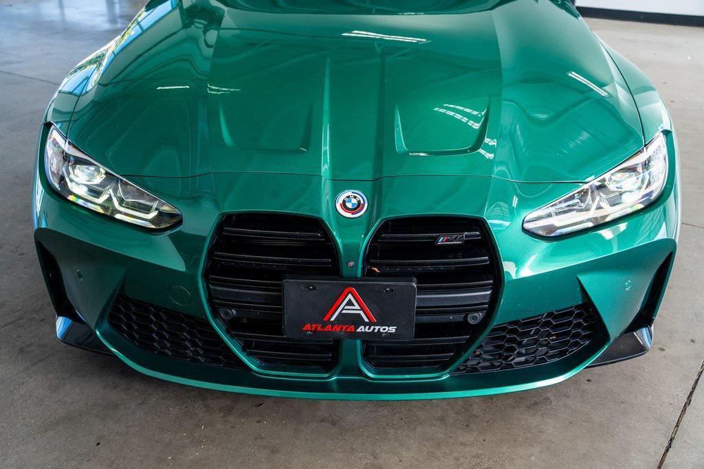 used 2022 BMW M4 car, priced at $59,999