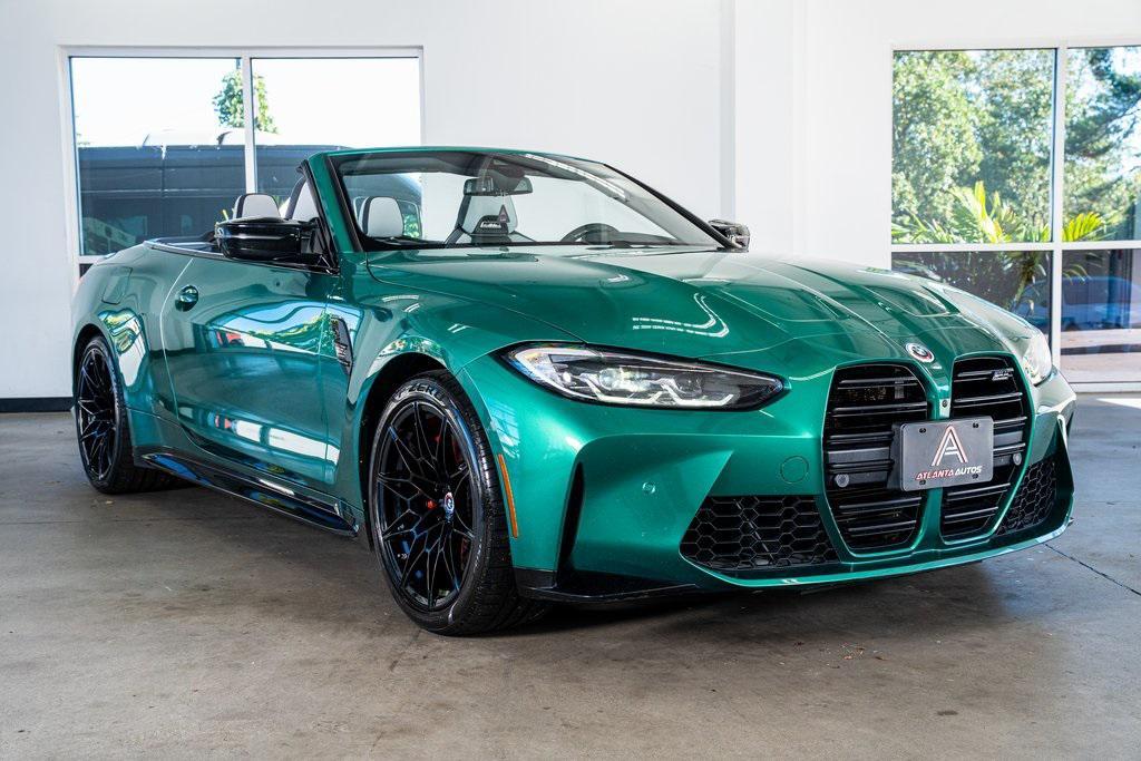 used 2022 BMW M4 car, priced at $59,999