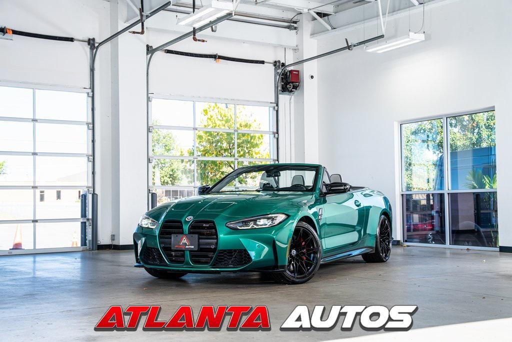 used 2022 BMW M4 car, priced at $59,999