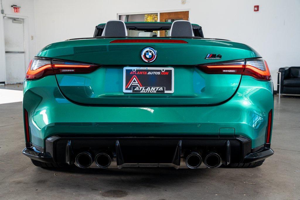 used 2022 BMW M4 car, priced at $59,999