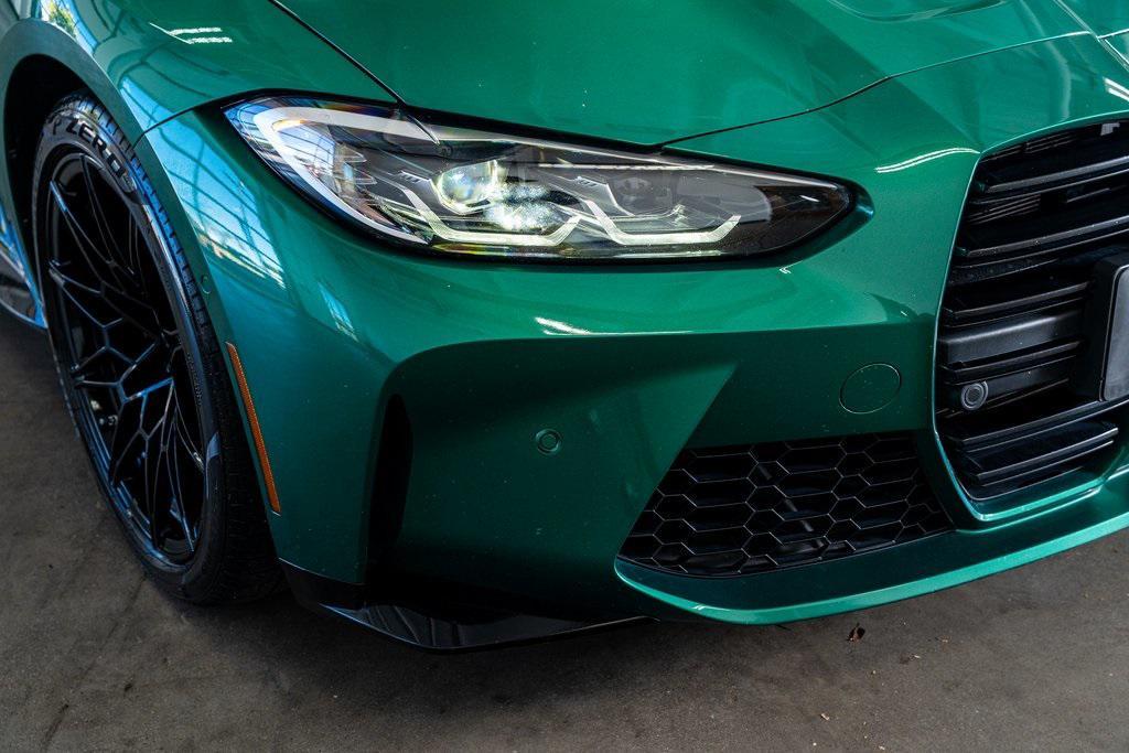used 2022 BMW M4 car, priced at $59,999