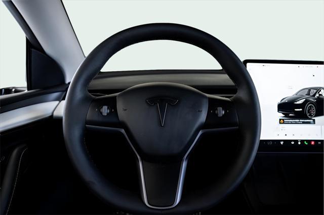 used 2024 Tesla Model Y car, priced at $44,999