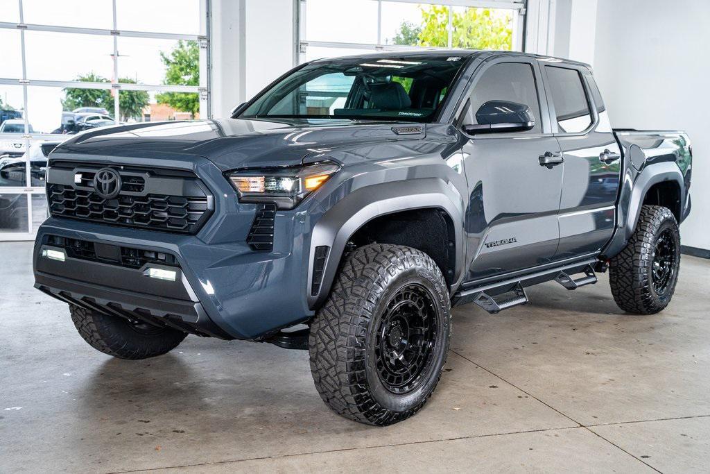 used 2025 Toyota Tacoma car, priced at $47,999