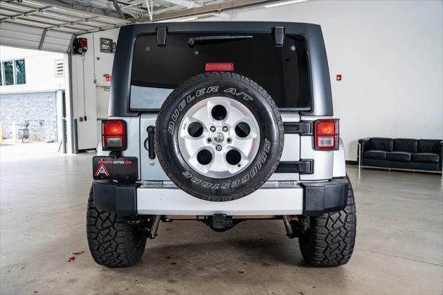 used 2014 Jeep Wrangler Unlimited car, priced at $21,999
