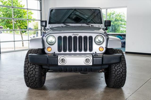 used 2014 Jeep Wrangler Unlimited car, priced at $21,999