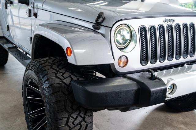used 2014 Jeep Wrangler Unlimited car, priced at $21,999