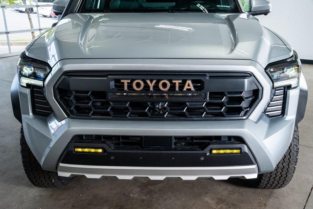 used 2024 Toyota Tacoma Hybrid car, priced at $56,999