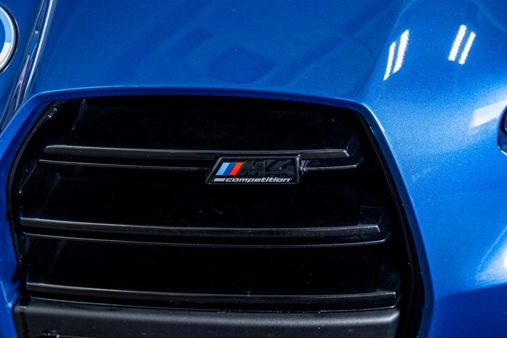 used 2023 BMW M4 car, priced at $75,999
