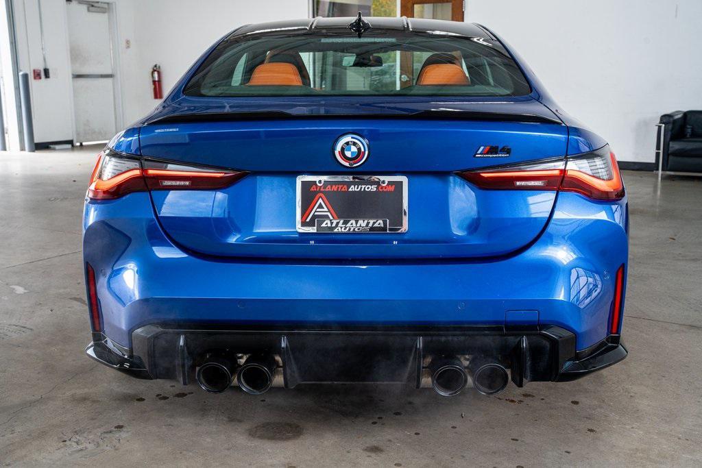 used 2023 BMW M4 car, priced at $75,999
