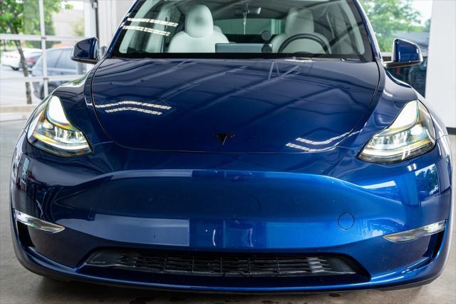 used 2023 Tesla Model Y car, priced at $32,999