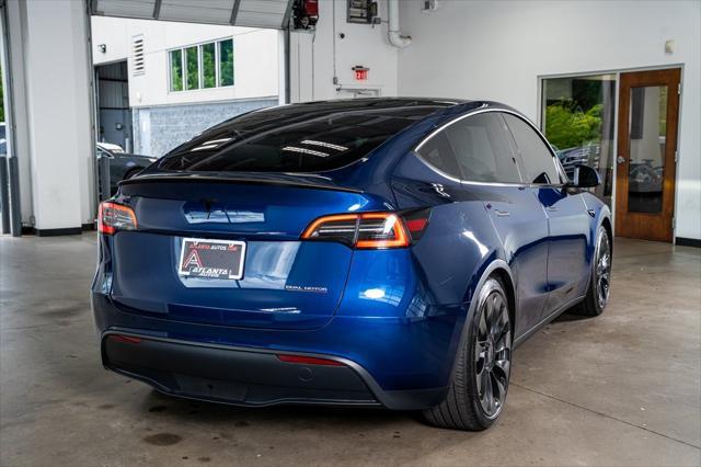 used 2023 Tesla Model Y car, priced at $32,999