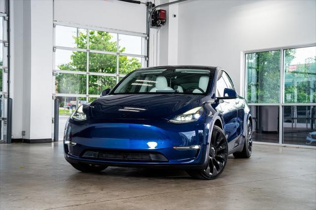 used 2023 Tesla Model Y car, priced at $32,999