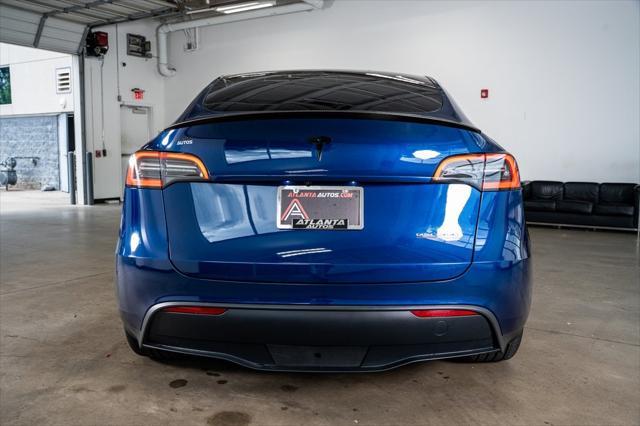 used 2023 Tesla Model Y car, priced at $32,999