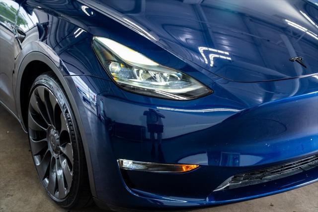 used 2023 Tesla Model Y car, priced at $32,999