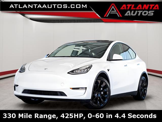 used 2022 Tesla Model Y car, priced at $28,999