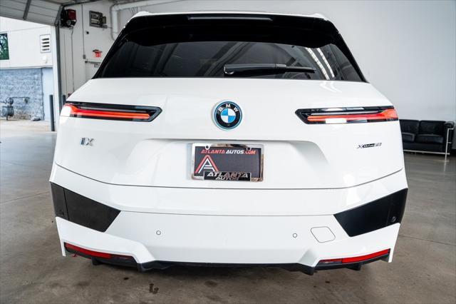 used 2024 BMW iX car, priced at $62,999