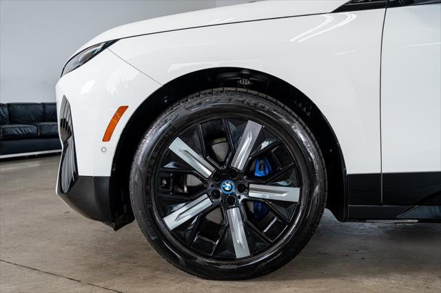 used 2024 BMW iX car, priced at $62,999