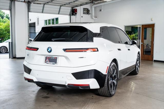 used 2024 BMW iX car, priced at $62,999