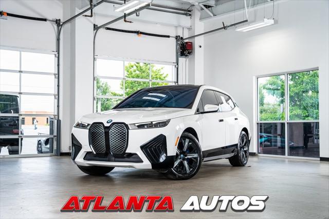 used 2024 BMW iX car, priced at $62,999