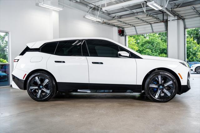 used 2024 BMW iX car, priced at $62,999