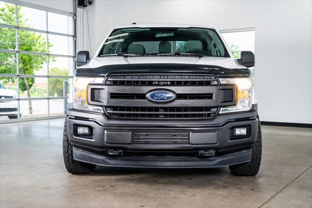 used 2018 Ford F-150 car, priced at $22,999