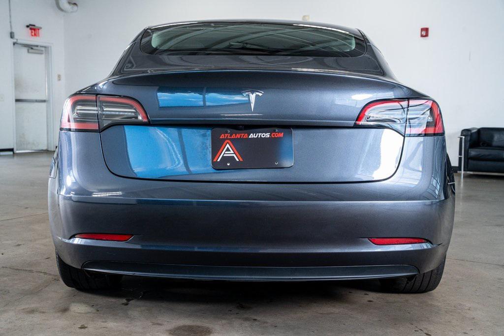 used 2023 Tesla Model 3 car, priced at $25,999