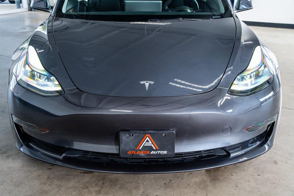 used 2023 Tesla Model 3 car, priced at $25,999