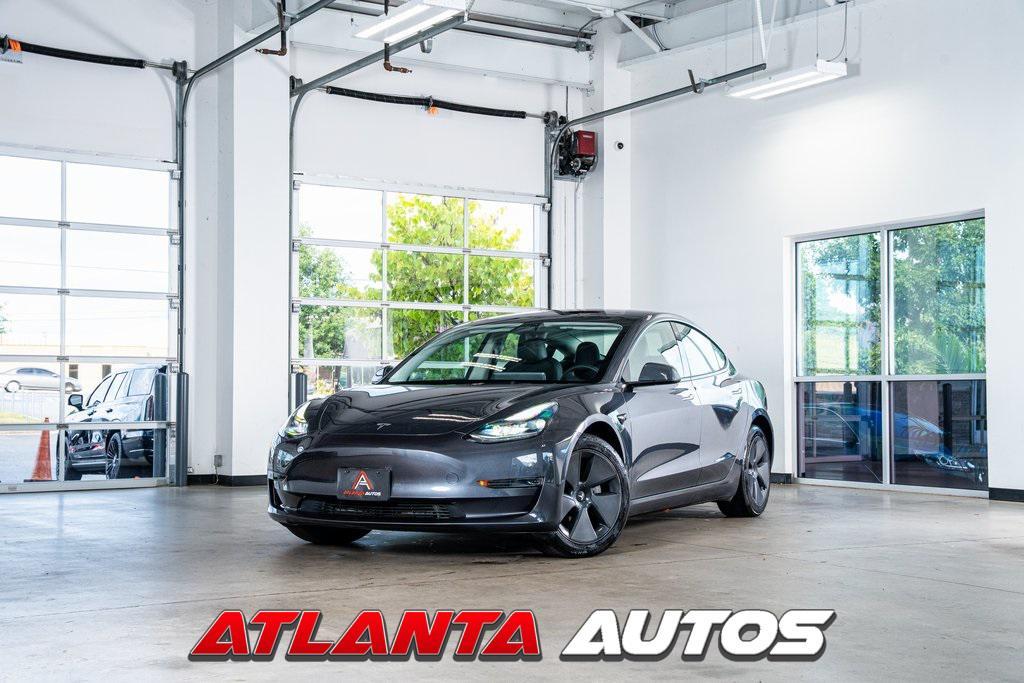 used 2023 Tesla Model 3 car, priced at $25,999