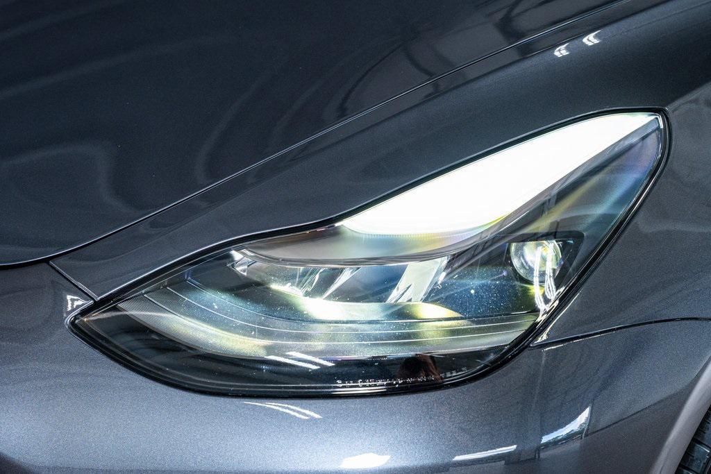 used 2023 Tesla Model 3 car, priced at $25,999