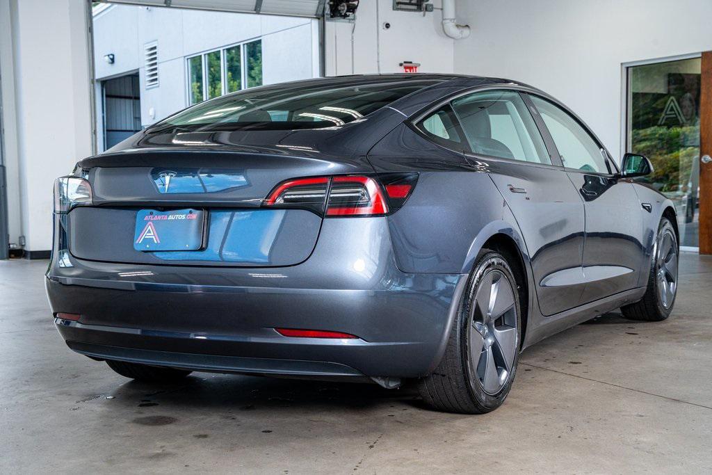 used 2023 Tesla Model 3 car, priced at $25,999