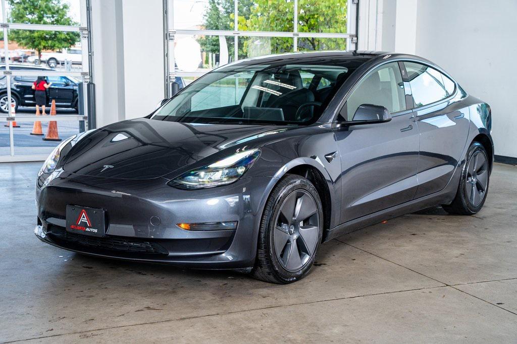 used 2023 Tesla Model 3 car, priced at $25,999