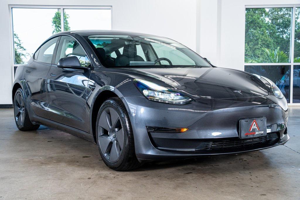used 2023 Tesla Model 3 car, priced at $25,999