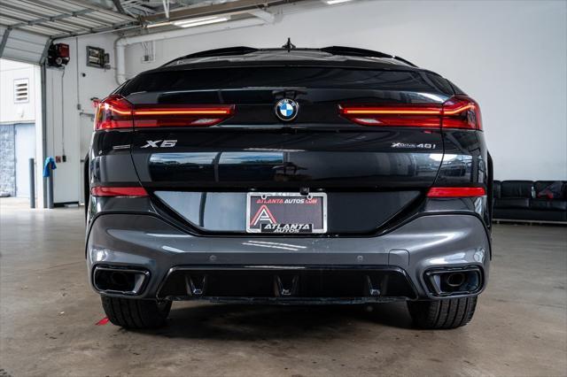 used 2022 BMW X6 car, priced at $58,999