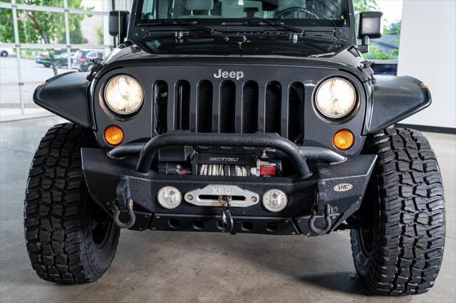 used 2010 Jeep Wrangler Unlimited car, priced at $16,999