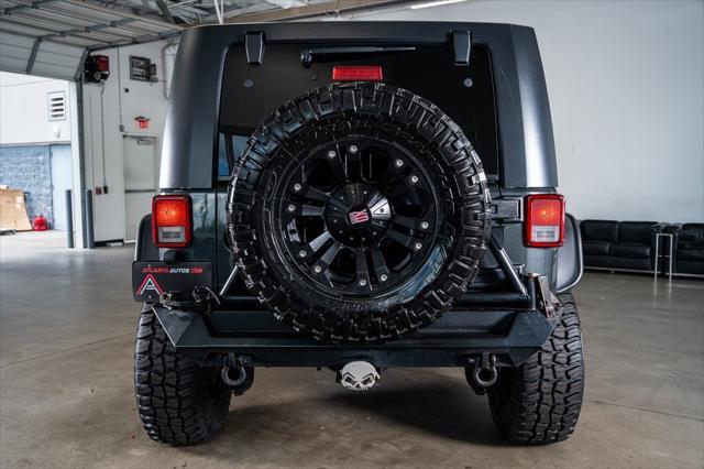 used 2010 Jeep Wrangler Unlimited car, priced at $16,999