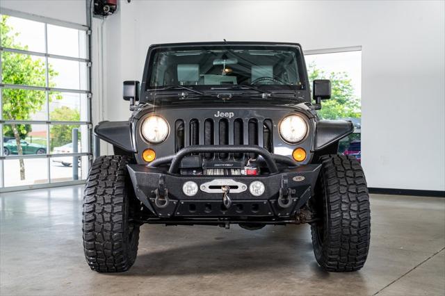 used 2010 Jeep Wrangler Unlimited car, priced at $16,999
