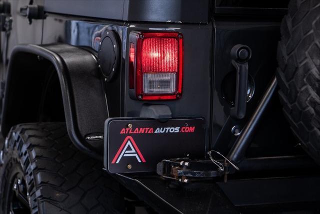 used 2010 Jeep Wrangler Unlimited car, priced at $17,999