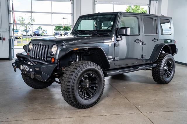 used 2010 Jeep Wrangler Unlimited car, priced at $16,999