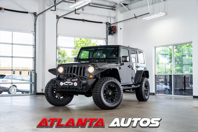 used 2010 Jeep Wrangler Unlimited car, priced at $16,999