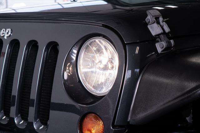 used 2010 Jeep Wrangler Unlimited car, priced at $17,999