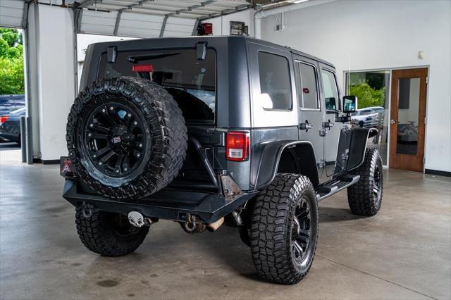 used 2010 Jeep Wrangler Unlimited car, priced at $16,999