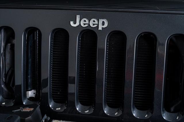 used 2010 Jeep Wrangler Unlimited car, priced at $16,999