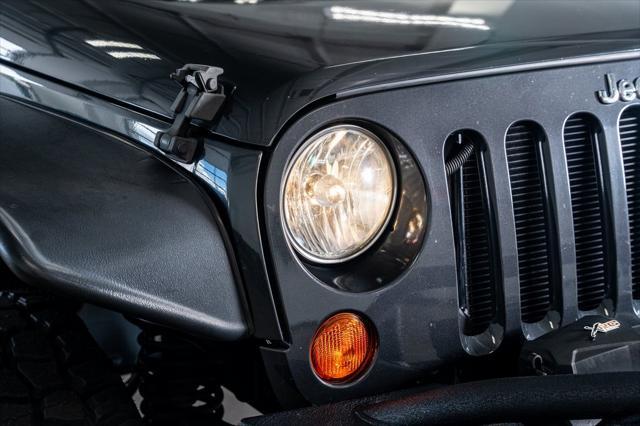 used 2010 Jeep Wrangler Unlimited car, priced at $16,999