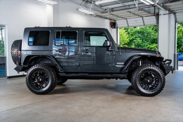 used 2010 Jeep Wrangler Unlimited car, priced at $16,999