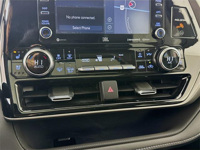 used 2021 Toyota Highlander Hybrid car, priced at $30,739